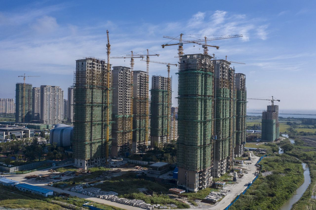 趁内地开发商陷困 香港大亨抢购优质土地